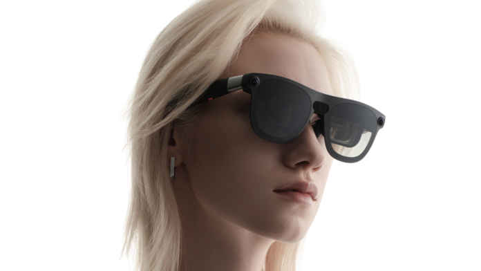 xreal-aura-model-wearing-glasses-scaled-1.png